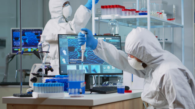 https://www.freepik.com/free-photo/research-scientist-protection-suit-using-micropipette-filling-test-tubes-lab-team-microbiologists-examining-virus-evolution-using-high-tech-analysing-treatment-development-against-covid19_17876891.htm#page=1&query=covid%20lab&position=7