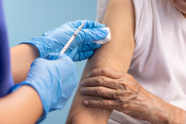 Closeup nurse doing vaccine injection to senior woman. https://www.freepik.com/premium-photo/closeup-nurse-doing-vaccine-injection-senior-woman_11875658.htm#page=1&query=covid%20shot&position=21&from_view=search