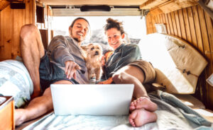 https://www.freepik.com/premium-photo/independent-couple-with-cute-dog-using-laptop-retro-mini-van-transport_20023178.htm#page=1&query=digital%20nomad&position=46&from_view=search