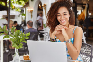 https://www.freepik.com/free-photo/photo-glad-adorable-curly-african-woman-sits-front-opened-laptop-computer-sidewalk-cafe-satisfied-make-good-presentation_9591785.htm?query=digital%20nomad