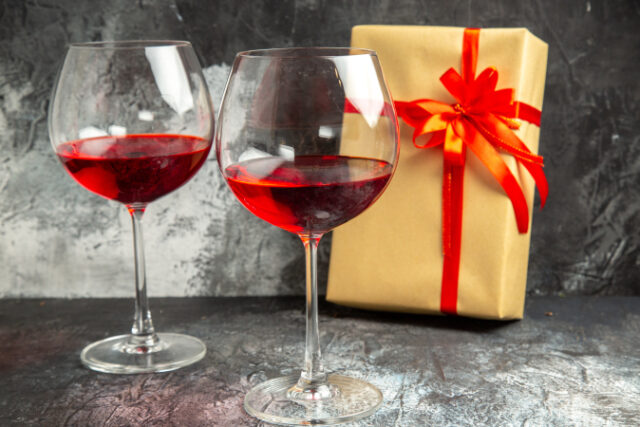 https://www.freepik.com/free-photo/front-view-glasses-wine-gift-dark_15916033.htm#page=1&query=bar%20gifts&position=4&from_view=search