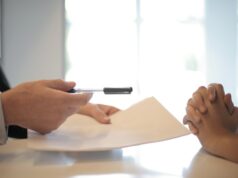 https://www.pexels.com/photo/crop-businessman-giving-contract-to-woman-to-sign-3760067/
