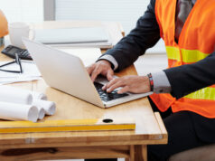 https://www.freepik.com/free-photo/unrecognizable-man-neon-safety-vest-business-suit-sitting-desk-using-laptop_5577208.htm#page=1&query=business%20safety&position=3&from_view=search