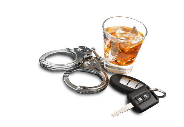 Whiskey with car keys and handcuffs isolated on white https://www.freepik.com/premium-photo/whiskey-with-car-keys-handcuffs-isolated-white_20320983.htm#page=1&query=DUI&position=32&from_view=search