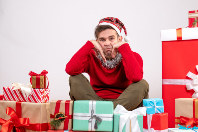 https://www.freepik.com/free-photo/front-view-depressed-young-man-sitting-around-xmas-gifts_11818340.htm#page=1&query=holiday%20depression&position=35&from_view=search