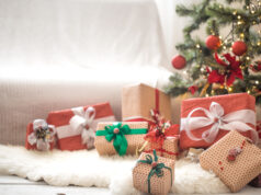 https://www.freepik.com/free-photo/pile-christmas-presents-light-wall-wooden-table-with-cozy-rug-christmas-decorations_10895767.htm#page=1&query=holiday%20shopping&position=13&from_view=search