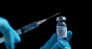 https://www.freepik.com/premium-photo/hand-blue-glove-holding-vaccine-syringe-injection-prevention-immunization-treatment-from-corona-virus-infection_8657553.htm#query=covid%20vaccination&position=38&from_view=search