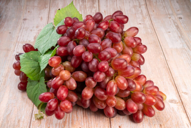 https://www.freepik.com/premium-photo/red-grape-with-leaves-wooden-background-bunch-fresh-red-grapes-with-leaves_21380589.htm#query=australian%20wines&position=12&from_view=search