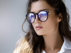 https://www.freepik.com/premium-photo/close-up-portrait-young-woman-with-reflection-modern-city-inside-eyeglasses_7835481.htm#query=blue%20light%20glasses&position=12&from_view=search