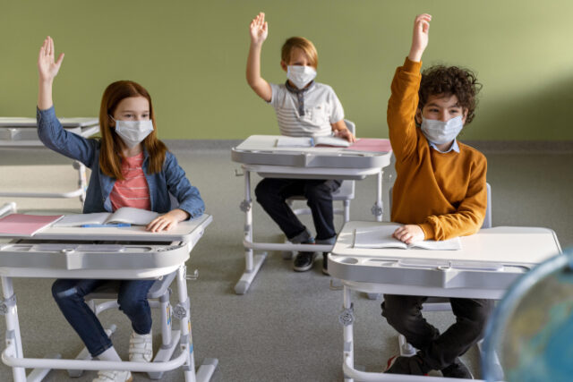 https://www.freepik.com/free-photo/front-view-children-with-medical-masks-school-raising-their-hands_12367070.htm#query=kids%20covid&position=7&from_view=search