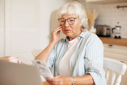 https://www.freepik.com/free-photo/portrait-frustrated-gray-haired-female-pensioner-wearing-eyeglasses-sitting-kitchen-table-with-laptop-holding-bill-touching-face-shocked-with-amount-total-sum-electricity_11200030.htm#query=looking%20at%20bills&position=0&from_view=search