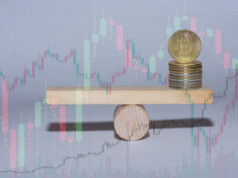 https://www.vecteezy.com/photo/5617363-stacked-bitcoin-on-a-wooden-seesaw-with-charts-from-the-market