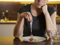 https://www.freepik.com/free-photo/woman-trying-eat-healthy-home_21534922.htm#query=eating%20disorders&position=29&from_view=search