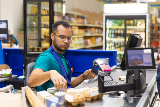 https://www.freepik.com/free-photo/focused-african-american-cashier-scanning-goods-checkout_6628372.htm#query=supermarket%20checkout&position=49&from_view=search
