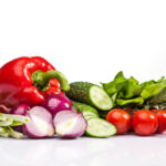 The fresh vegetables on the white background