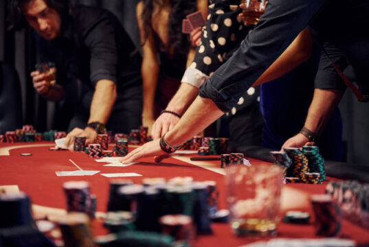 https://www.freepik.com/premium-photo/people-elegant-clothes-standing-playing-poker-casino-together_6657934.htm#query=gambling&position=35&from_view=search