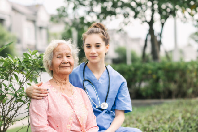 https://www.vecteezy.com/photo/1223455-caregiver-embracing-senior-in-park