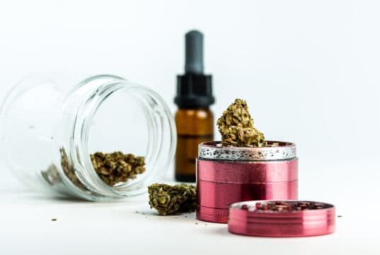 https://www.vecteezy.com/photo/6933774-close-up-of-medical-marijuana-buds-and-cannabis-oil-on-white-background