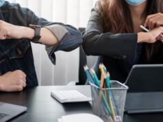 https://www.vecteezy.com/photo/2448550-two-young-diverse-business-colleagues-wearing-face-protective-masks-bumping-elbows-greeting-each-other-while-working-during-covid-19-quarantine