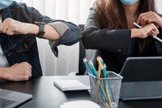 https://www.vecteezy.com/photo/2448550-two-young-diverse-business-colleagues-wearing-face-protective-masks-bumping-elbows-greeting-each-other-while-working-during-covid-19-quarantine