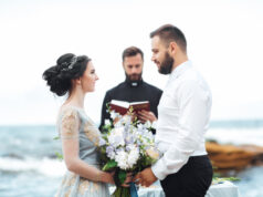https://www.vecteezy.com/photo/2403480-wedding-couple-on-the-ocean-with-a-priest