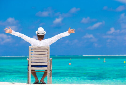 https://www.vecteezy.com/photo/919352-young-man-enjoying-summer-vacation-on-tropical-beach