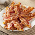 Bacon (Image Credit: bhofack2 / iStock.)