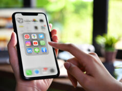 https://www.freepik.com/premium-photo/female-holding-smartphone-with-icons-social-media-screen-coffee-shop_7704839.htm#query=social%20media&position=10&from_view=search
