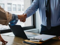 https://www.pexels.com/photo/crop-colleagues-shaking-hands-in-office-5673488/