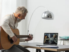 https://www.freepik.com/premium-photo/senior-man-home-studying-guitar-lessons-laptop_15030745.htm?query=music%20teacher