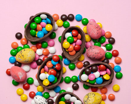 https://www.vecteezy.com/photo/3492661-chocolate-easter-eggs-and-sweet-candies-on-pink-background-with-copy-space