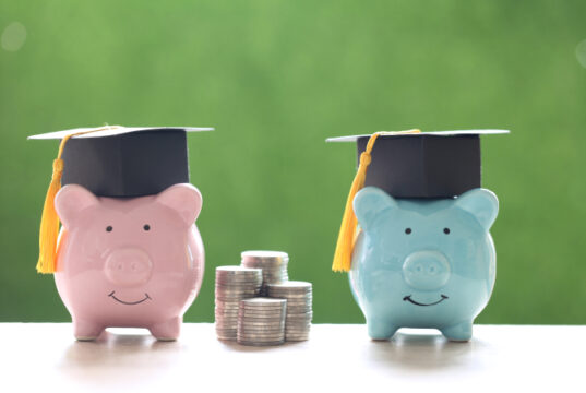 https://www.vecteezy.com/photo/2160131-graduation-hats-on-piggy-banks-and-a-stack-of-coins-on-a-natural-green-background-saving-money-for-education-concept