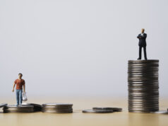 https://www.vecteezy.com/photo/6932798-one-man-standing-on-higher-coins-stacking-in-other-man-for-different-salary-and-unequal-income-in-capitalism-country-concept