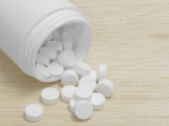 https://www.vecteezy.com/photo/1262646-pills-spilling-out-of-pill-bottle-on-wood-back-ground