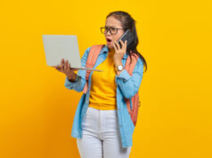 https://www.vecteezy.com/photo/6166956-portrait-of-surprised-young-asian-woman-student-in-casual-clothes-with-backpack-talking-on-mobile-phone-and-using-laptop-isolated-on-yellow-background-education-in-college-university-concept