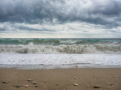 https://www.vecteezy.com/photo/2264162-seascape-with-crashing-waves-on-the-beach-and-dark-stormy-clouds