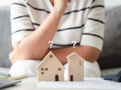 https://www.vecteezy.com/photo/5514593-woman-is-deciding-to-choose-house-with-small-wooden-house-model-with-question-marks-planning-to-buy-property-choose-what-s-the-best-home-loan-concepts