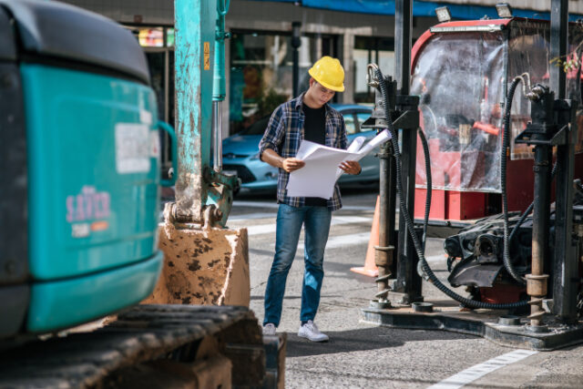 Civil engineers work on large road and machinery conditions. https://www.freepik.com/free-photo/civil-engineers-work-large-road-machinery-conditions_9294662.htm?query=road%20work