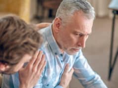 https://www.freepik.com/free-photo/dark-haired-male-doctor-looking-after-upset-serious-gray-headed-man-suffering-from-chest-pain_20880446.htm#query=heart%20attack&position=27&from_view=search
