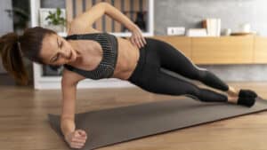 https://www.freepik.com/free-photo/full-shot-woman-doing-side-plank_12977412.htm?query=plank%20exercise