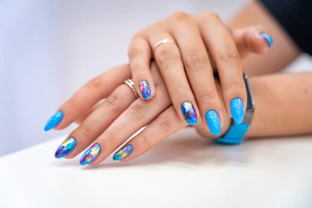 https://www.freepik.com/premium-photo/lot-color-gloss-manicure-hand-has-different-blotches-light_5444085.htm#query=gel%20manicure&position=48&from_view=search