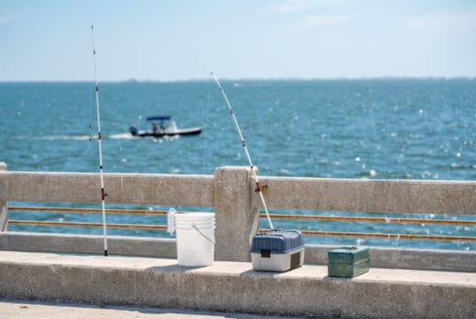 https://www.vecteezy.com/photo/1421494-fishing-poles-and-tackle-boxes-on-a-pier