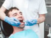 https://www.vecteezy.com/photo/5178494-dentist-examines-the-teeth-of-a-male-patient-on-a-dentist-s-chair