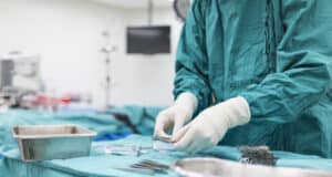 https://www.vecteezy.com/photo/991932-scrub-nurse-preparing-medical-instruments-for-operation