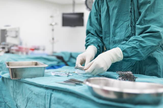 https://www.vecteezy.com/photo/991932-scrub-nurse-preparing-medical-instruments-for-operation
