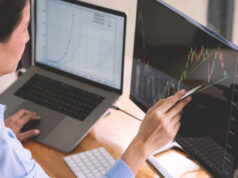 https://www.vecteezy.com/photo/6972588-stock-market-broker-in-formalwear-analyzing-graphs-on-screens-in-the-office-investment-concept