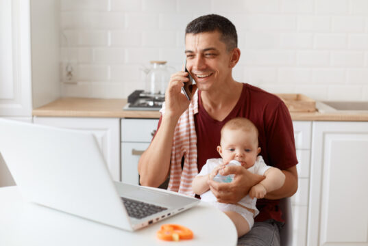 https://www.freepik.com/free-photo/smiling-happy-man-wearing-burgundy-casual-t-shirt-with-towel-his-shoulder-looking-after-baby-working-online-from-home-having-pleasant-conversation-with-client-partner_19137337.htm#query=wfh&position=22&from_view=search