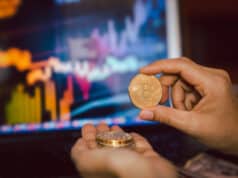https://www.vecteezy.com/photo/7467672-business-men-holding-bitcoin-whit-computer-trading-chart-in-background