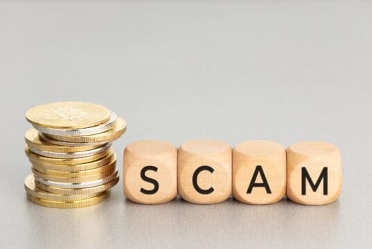 https://www.vecteezy.com/photo/7154616-cryptocurrency-scam-concept-stacked-crypto-coins-and-wooden-blocks-with-text-copy-space