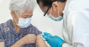 https://www.vecteezy.com/photo/5222012-elderly-asian-senior-woman-wearing-face-mask-getting-covid-19-or-coronavirus-vaccine-by-doctor-make-injection